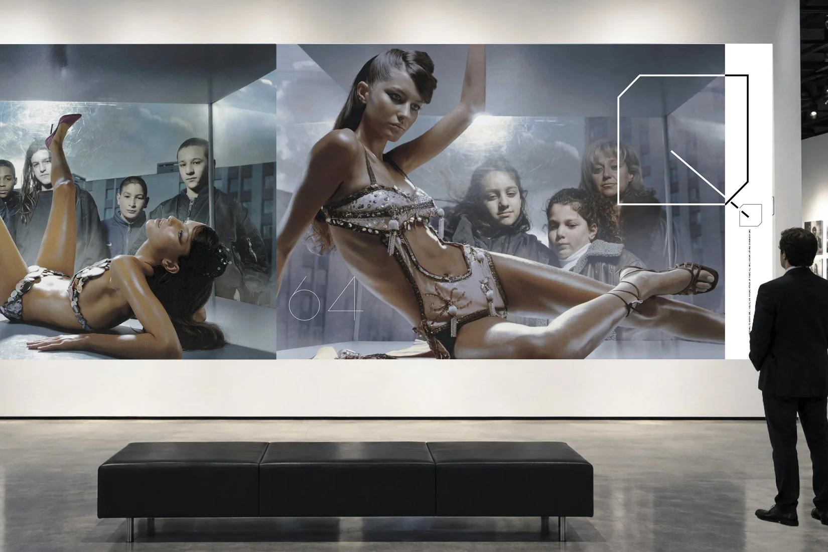 Exhibition visualisation displaying photographs of Gisele Bündchen with visitors in the background.