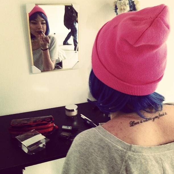 Aubrey getting dressed for a shoot at Goldilocks Gallery