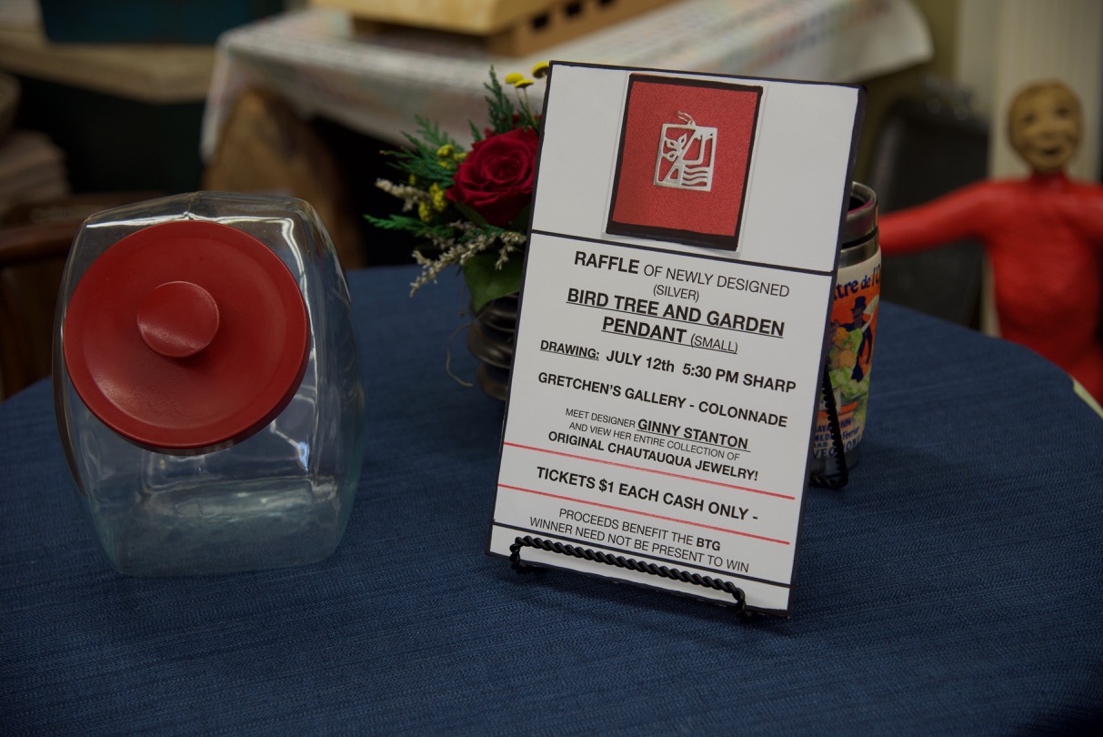 Gretchen's Gallery at the Colonnade raffling off a sterling silver bird charm, donating the proceeds to the BTG!