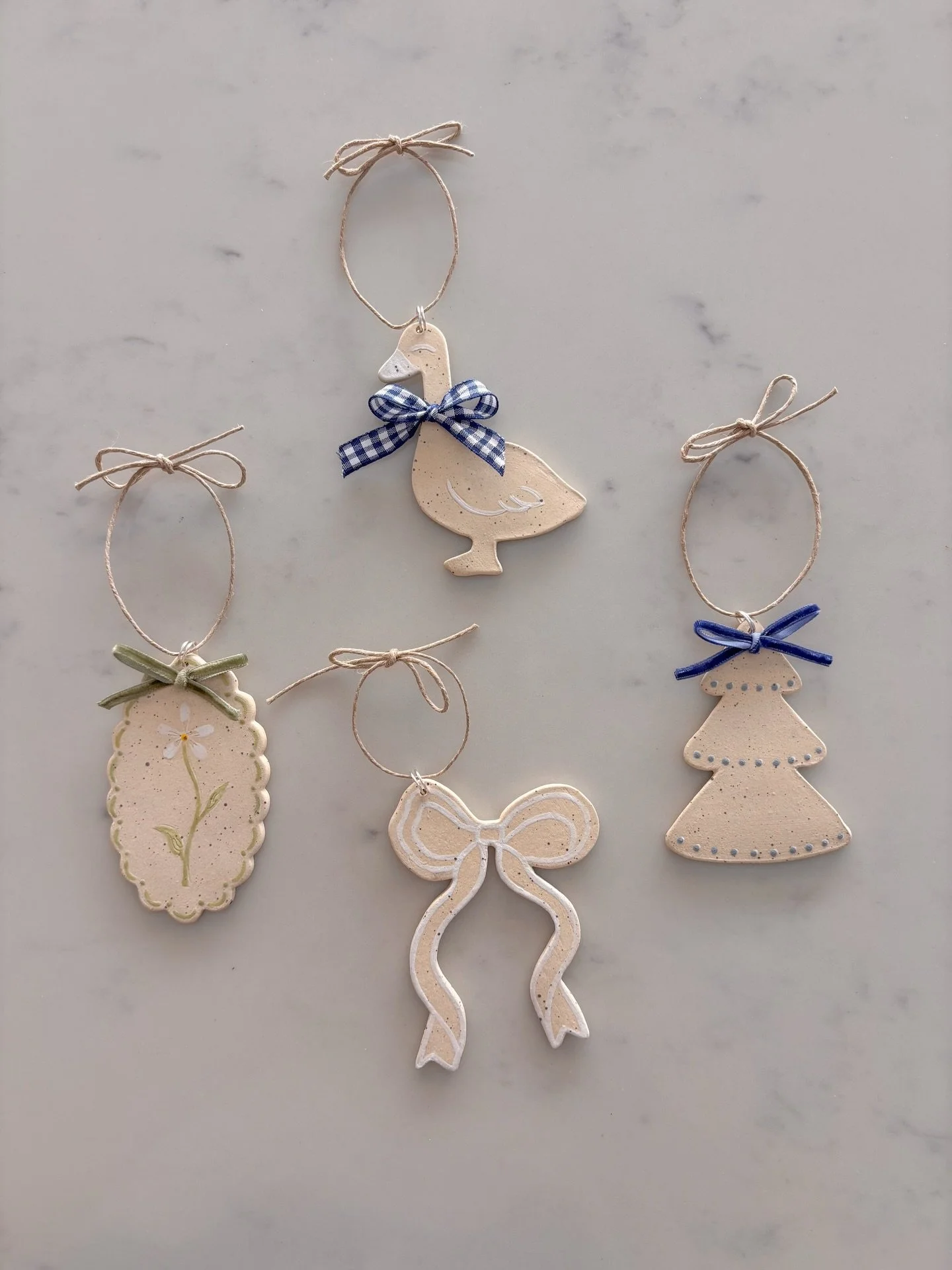 I have some cutie ornaments done, all hand painted. Some styles I have several of and some styles there is only one. $15 each, DM to purchase.