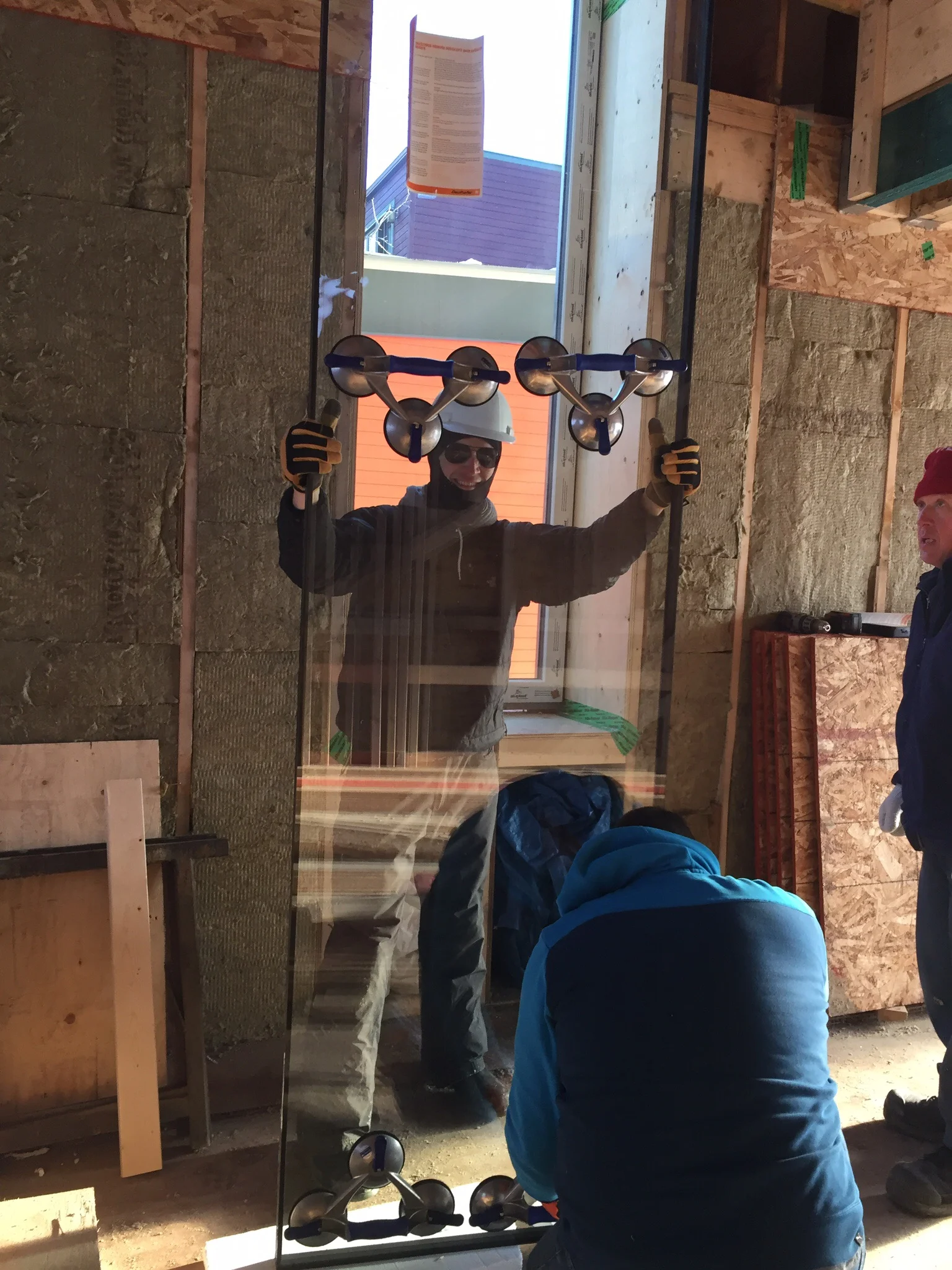 Keeping warm and holding one of the triple glazed glass unit that will keep us warm soon!