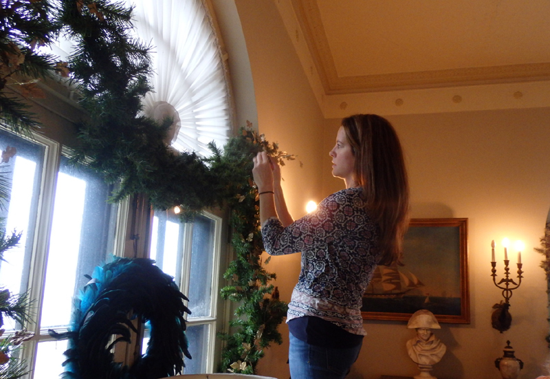 Vanderbilt Museum photo Krishtia McCord decorating French doors in Mr. Vanderbilt’s bedroom