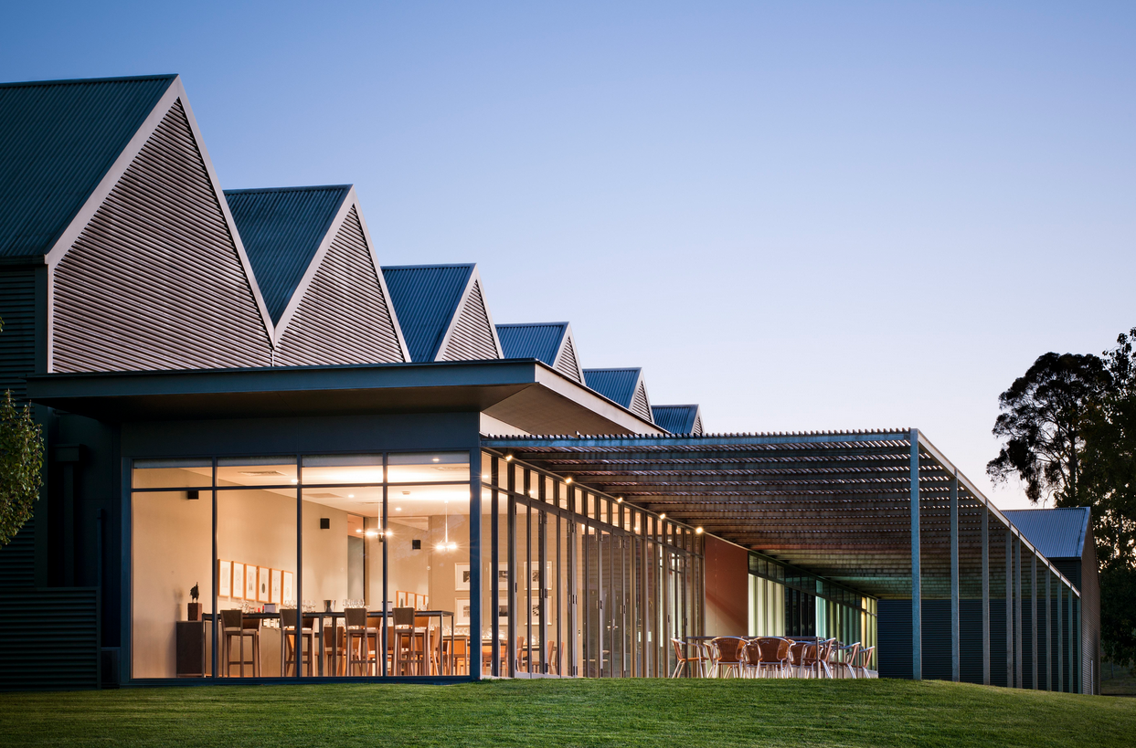 Shaw + Smith tasting room overlooking the vineyards at dusk.