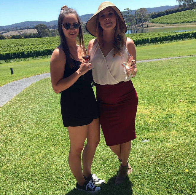 Jamie and her senior project team member, Olivia Molodonaf, pose with the view of the Shaw + Smith vineyards.