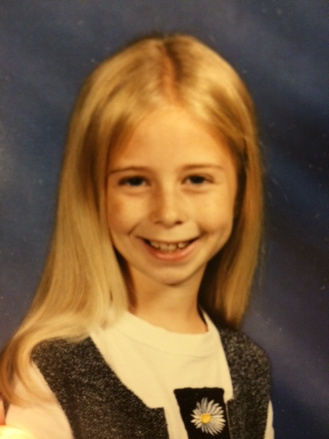 Little Alex poses for her yearbook photo