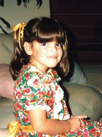 A pigtailed Ana on her way to the "Festa Junina", a Brazilian folk celebration.
