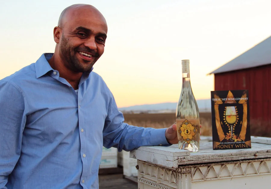 Ayele Solomon with his current Bee D'Vine wines. Photo courtesy of Molly Oleson.
