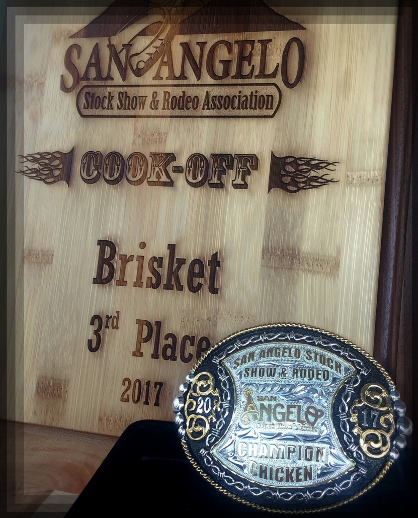 Competition prizes included a 3rd place Brisket plaque and the "Champion Chicken" belt buckle, both of which are displayed proudly at The Bear & Star . 
