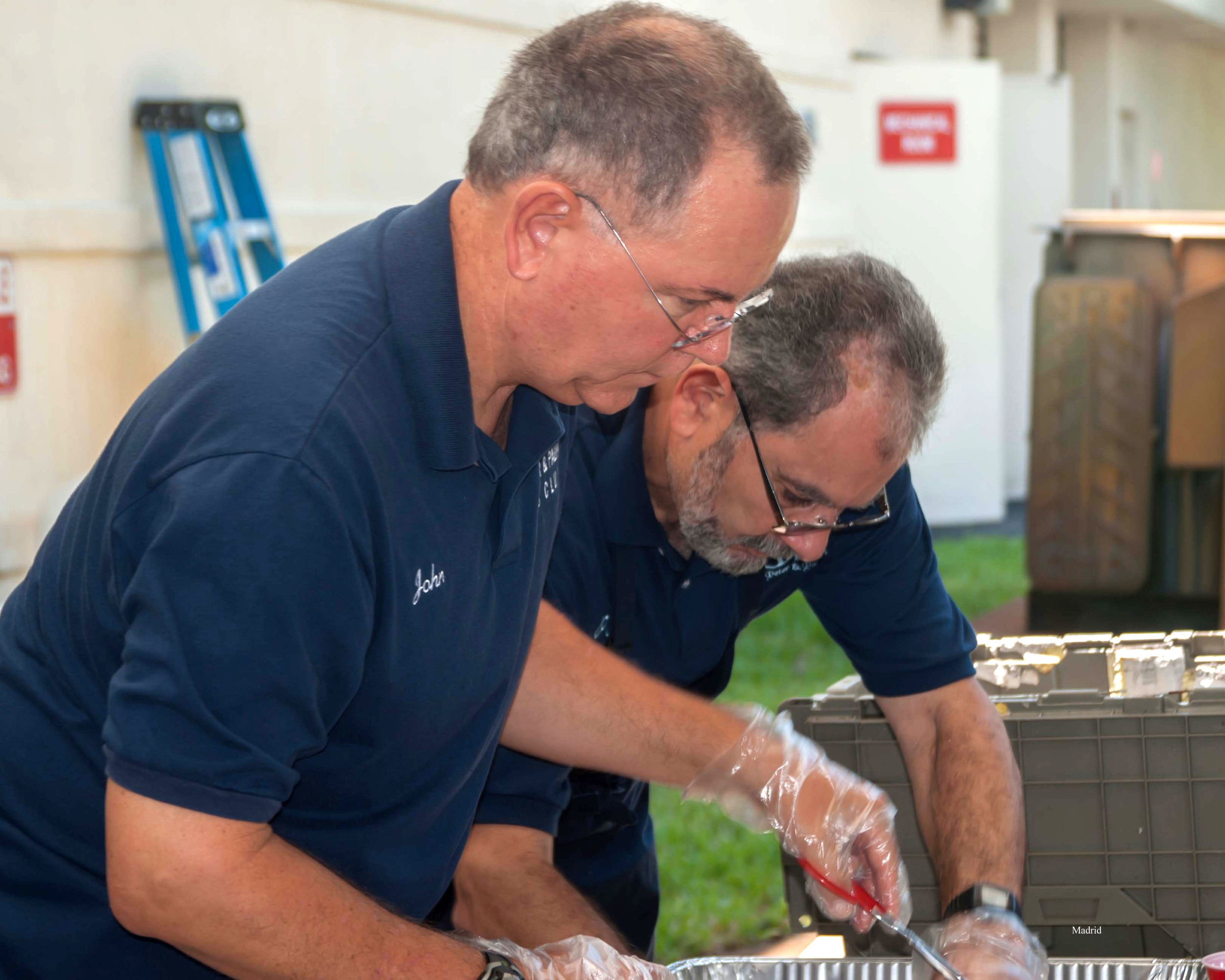 John & Pedro building burgers.jpg