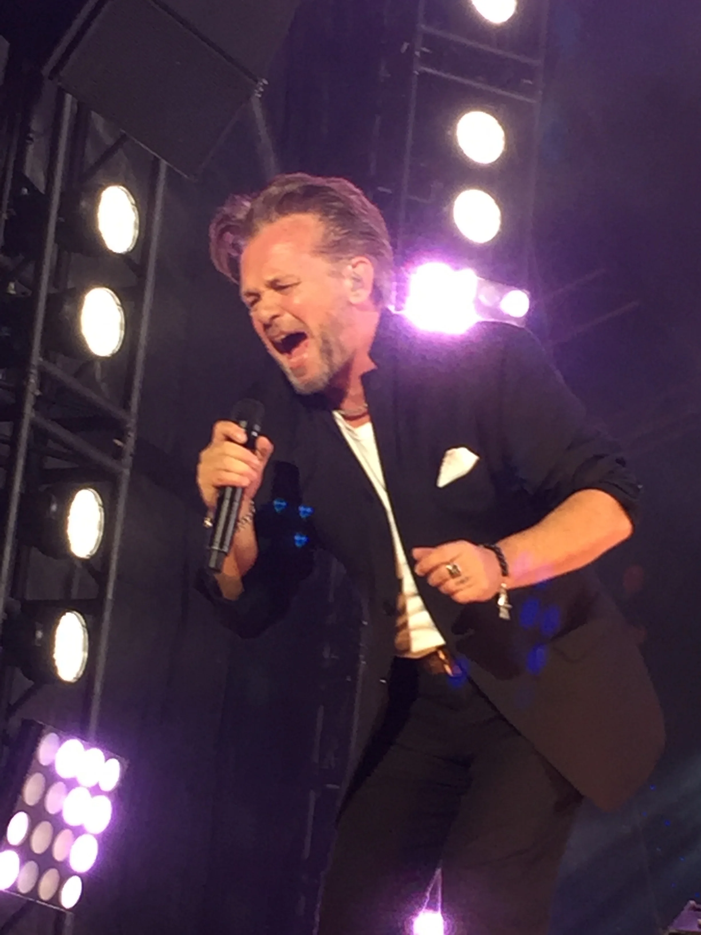 John Mellancamp takes the stage in downtown Phoenix for a free concert the night before the big game