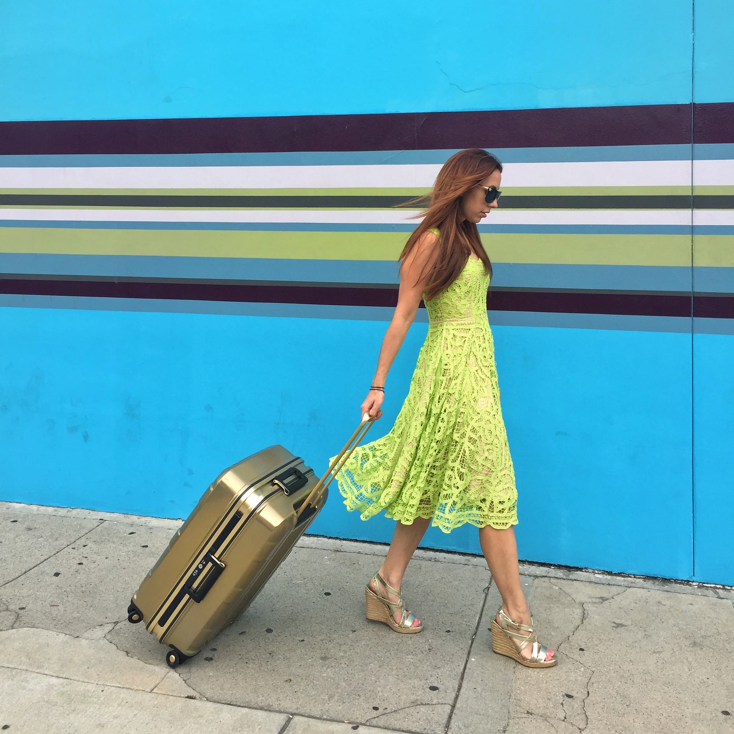 Although I love this fancy gold suitcase, it is probably a target for theft. I rarely check an expensive looking bag, and generally save the fancy luggage for carry-on's and road trips.