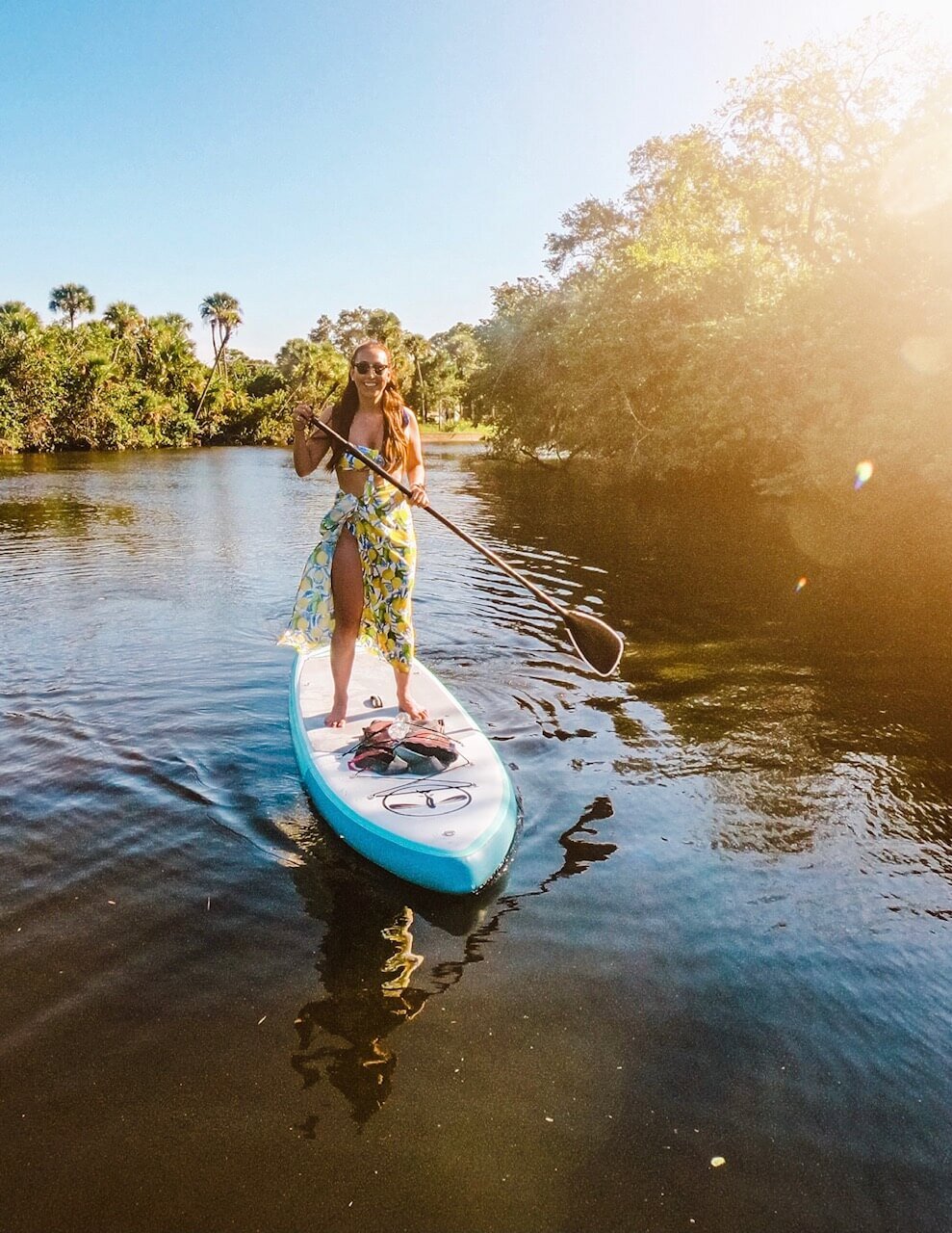 Valerie Trusted Travel Girl stand up paddle boarding in St Lucie River Best Things to Do in Stuart, Jensen Beach, and Martin County, Florida