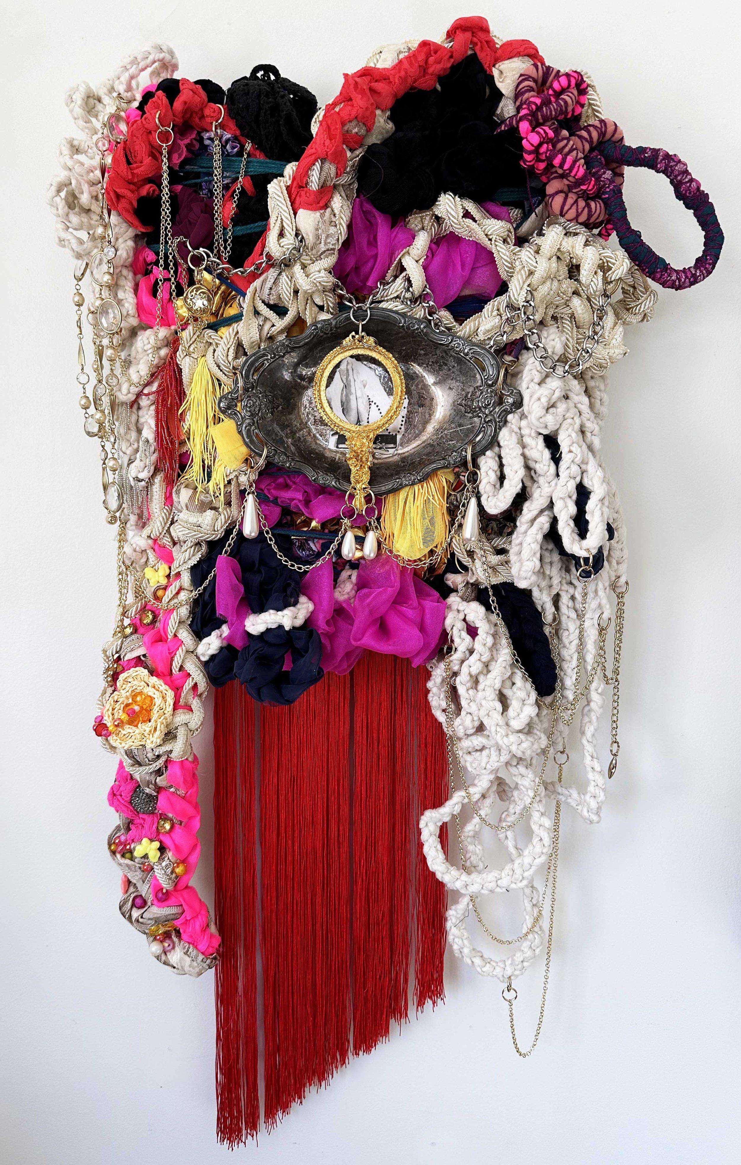 BrianAndrewWhiteley_Celtic Hands_Fabric, trimmings, chains, beads, collage, found objects  _21” x 37” _2024_StephanieMcGovern.jpg