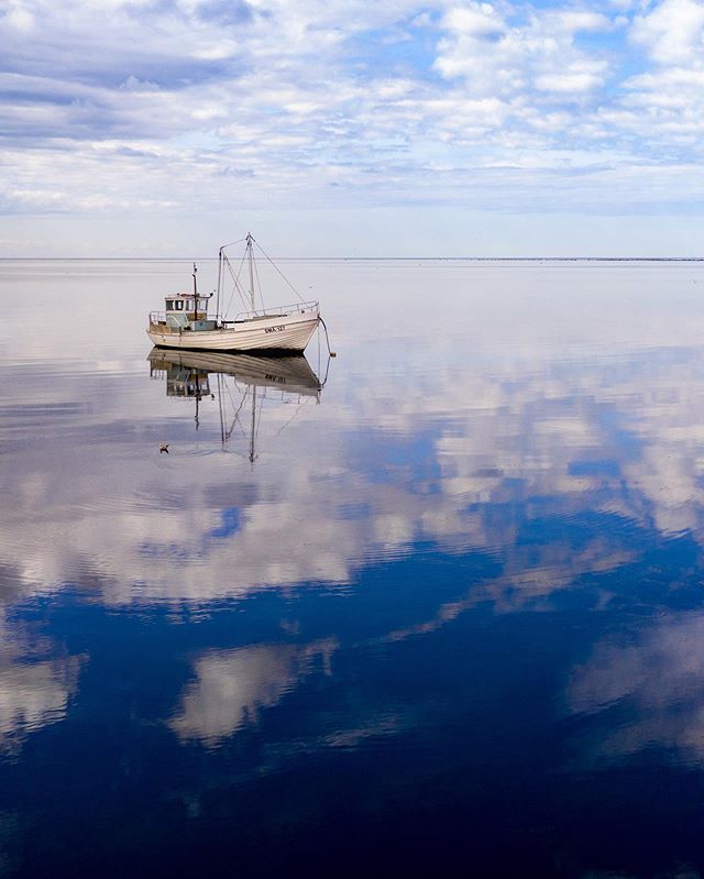 Fishing boat. #saaremaa #estonia #drone #mavic2pro #mavic #mavicpro2 #mavic2 #mavichasselblad #fishingboat #sea #reflection