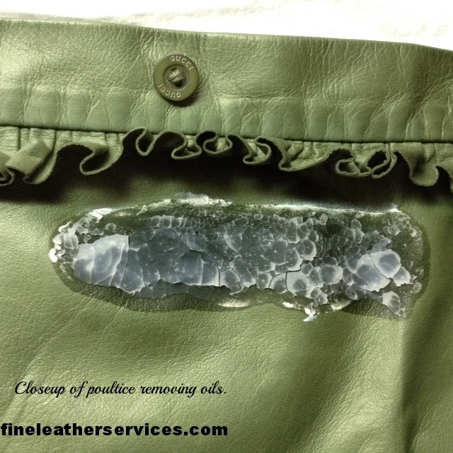 Close-up of leather stain removal