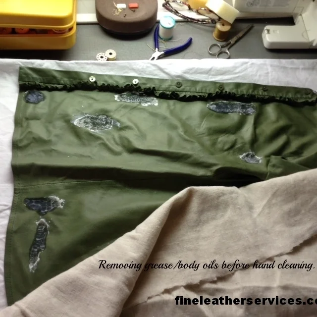 Removing grease stains from leather