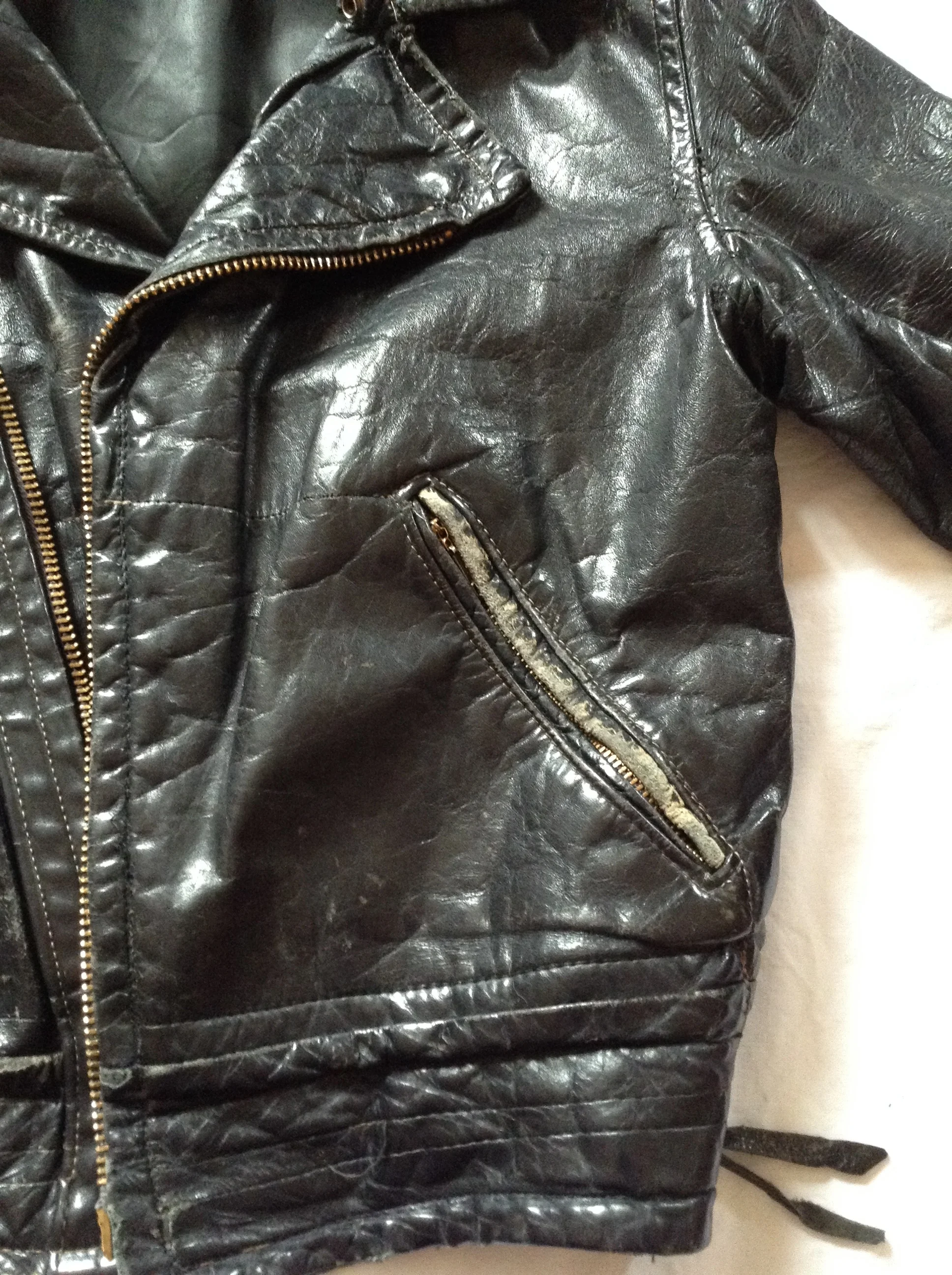 Conditioning, vintage biker jacket before.