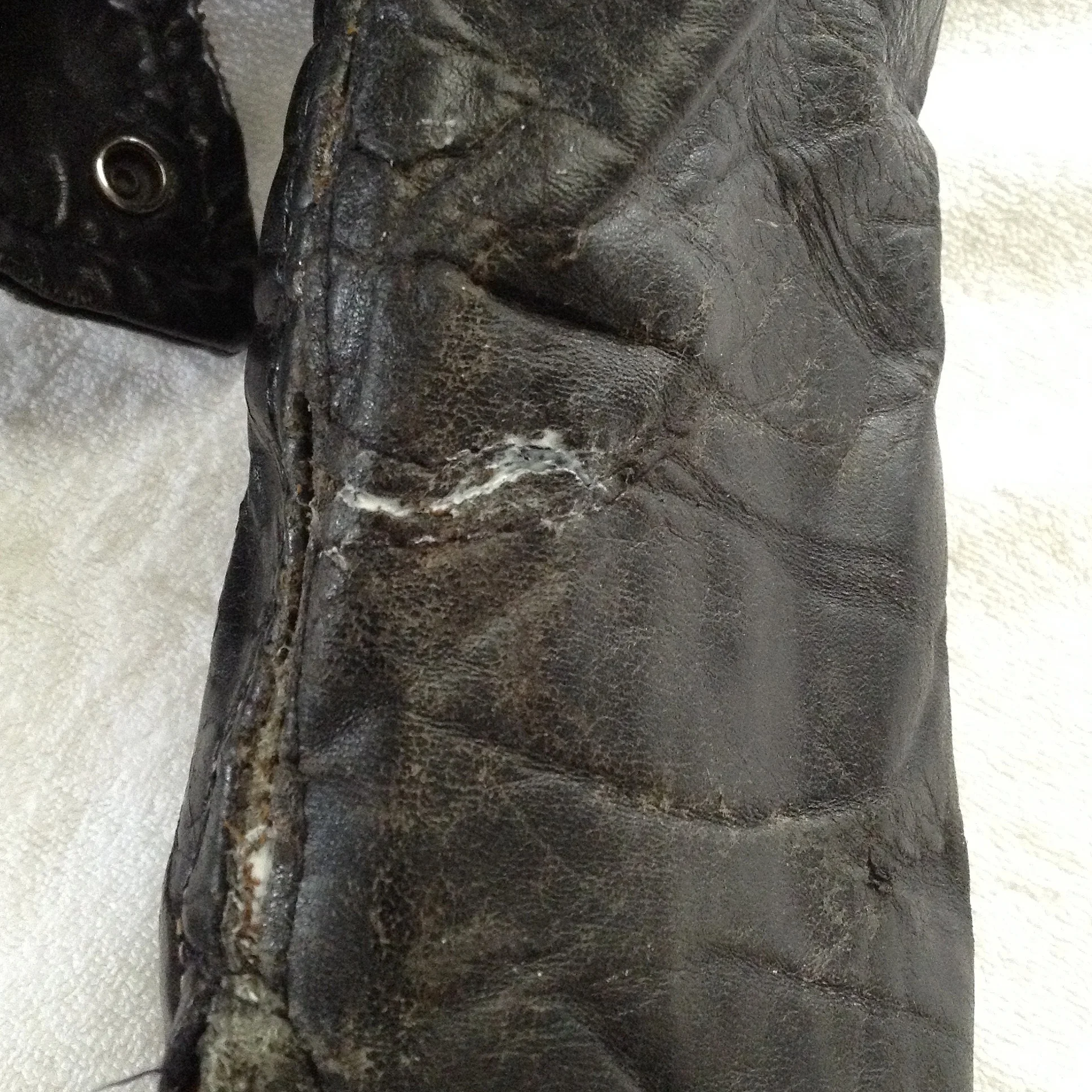 Repair of vintage 1950's biker jacket sleeve