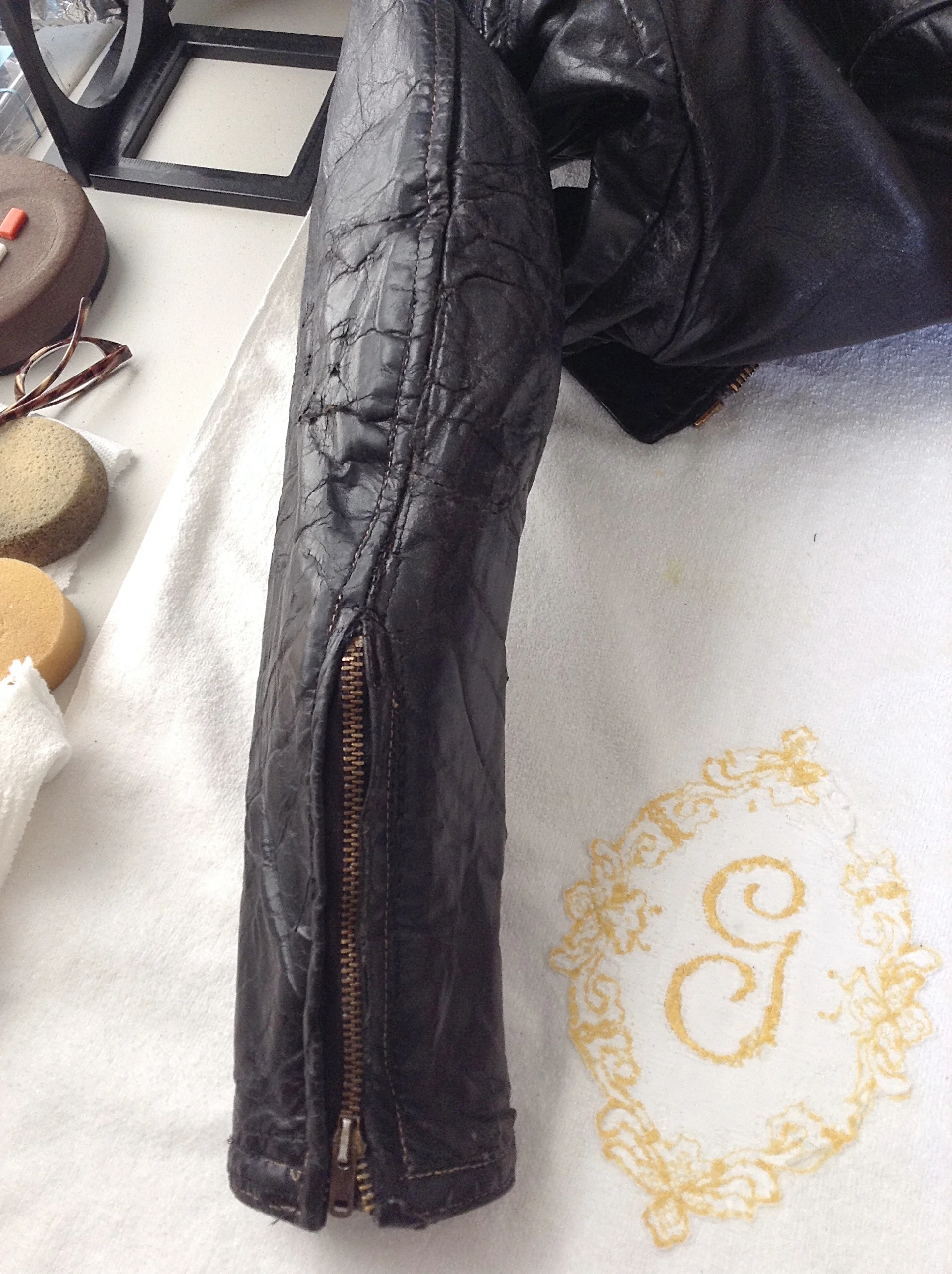 Vintage leather jacket sleeve, after.