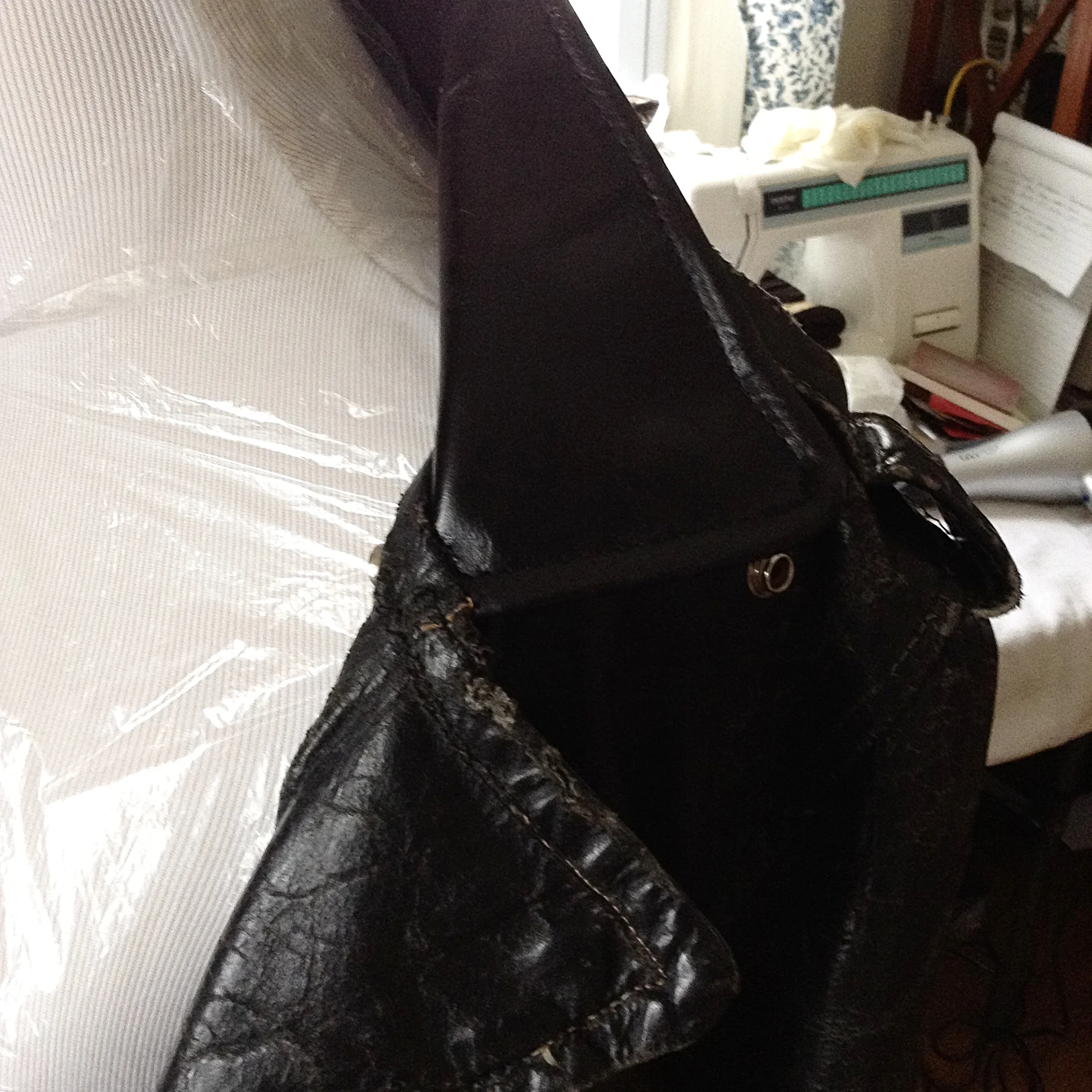 New leather collar prior to distressing, jacket restoration