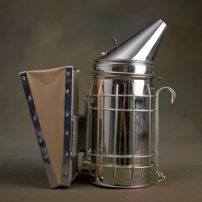 Our durable smoker (height 11") has all the features you’d expect at a price you wouldn’t. Stainless Steel Construction, Convenient Lid Tab, Protective Guard, Removable Bellow.
