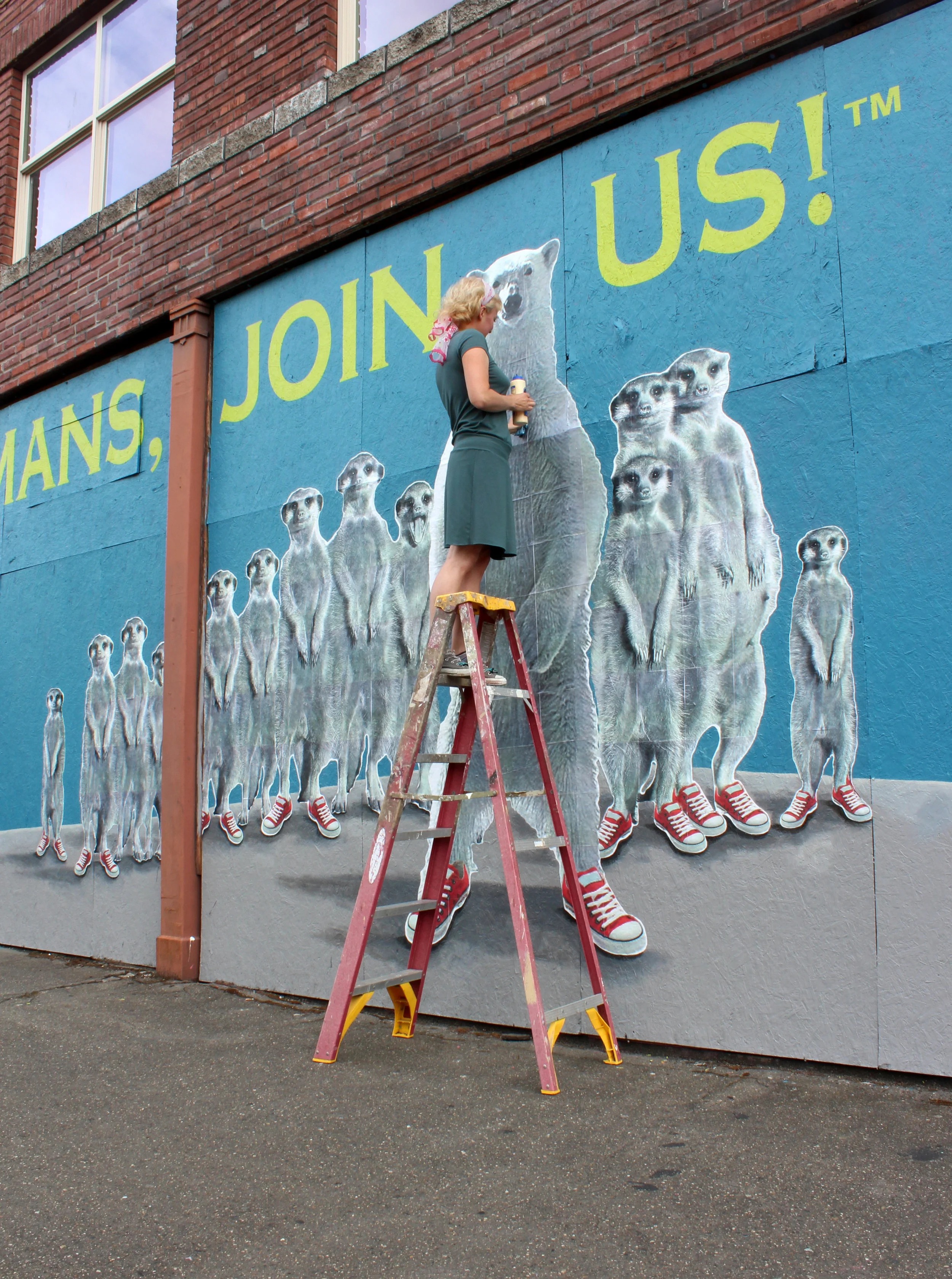 I'm adding detail to our mural.