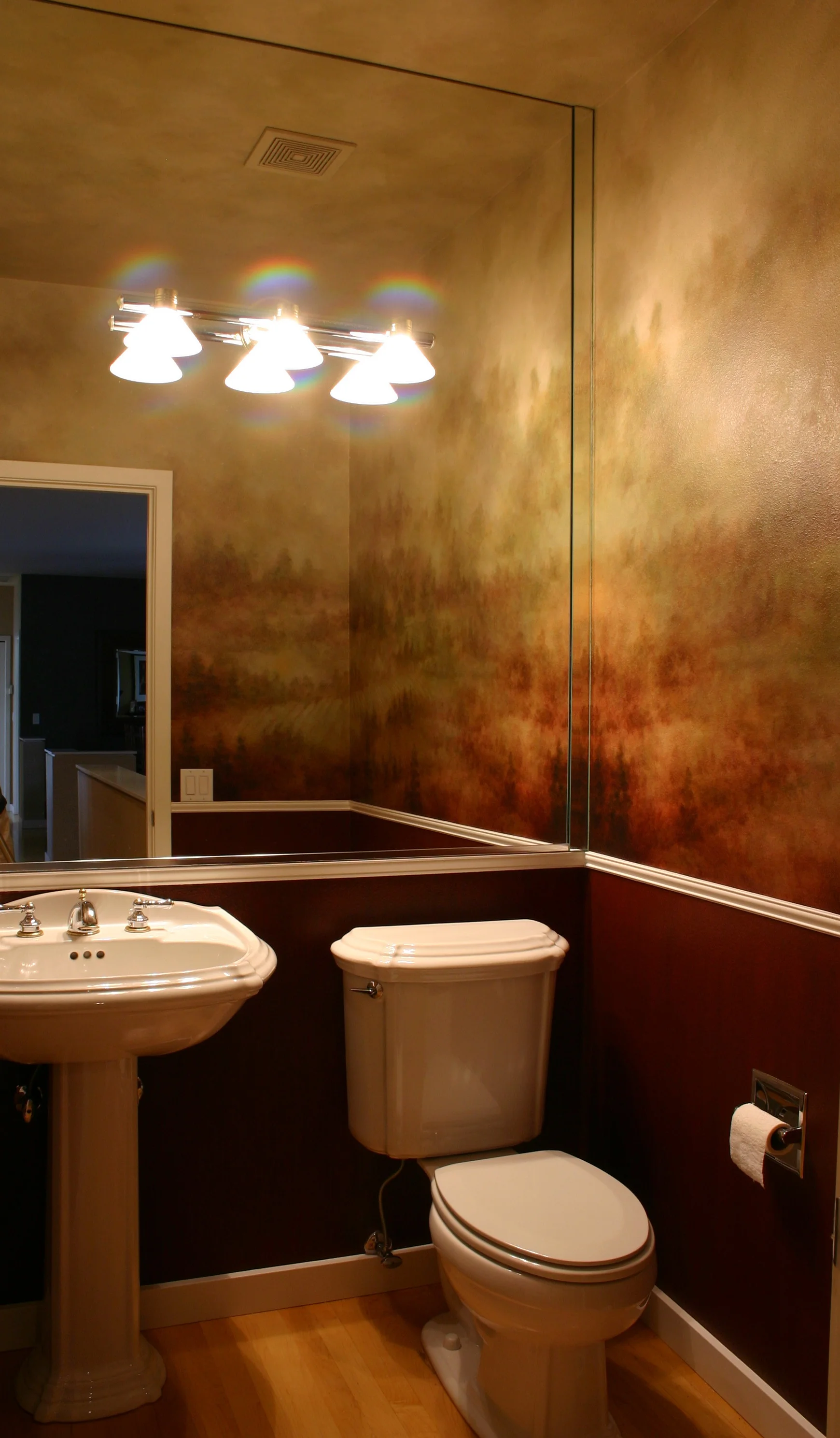 Landscape mural in powder room.