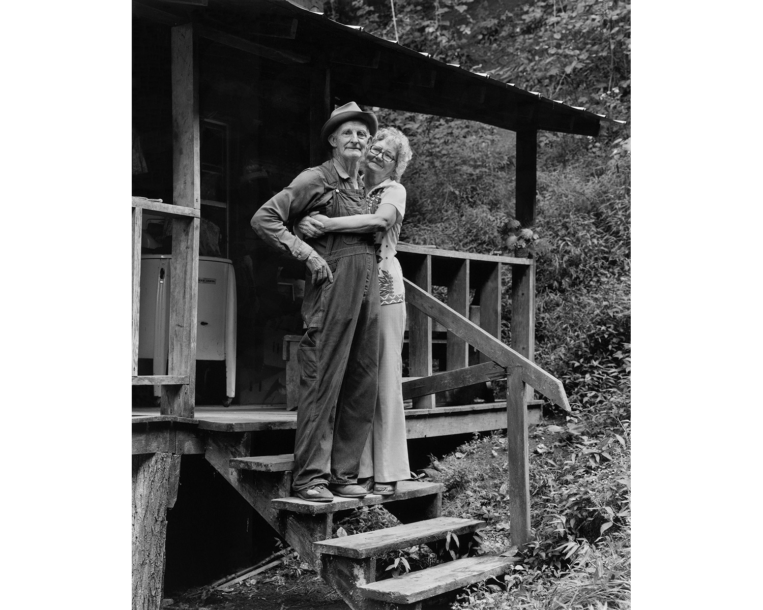 Collie & Zola PAyne cabin porch Appalachian photographer Tim Barnwell