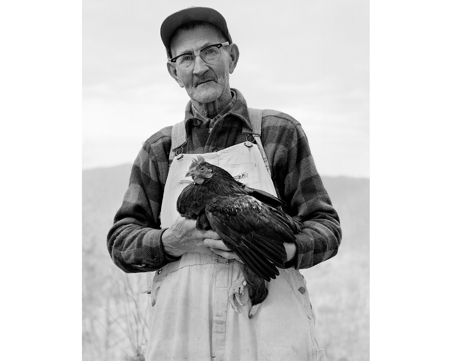Man one legged chicken gamecock fighting Appalachian photograper Tim Barnwell