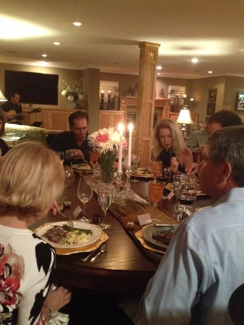 Guests Enjoying Veal Scallopini Dinner