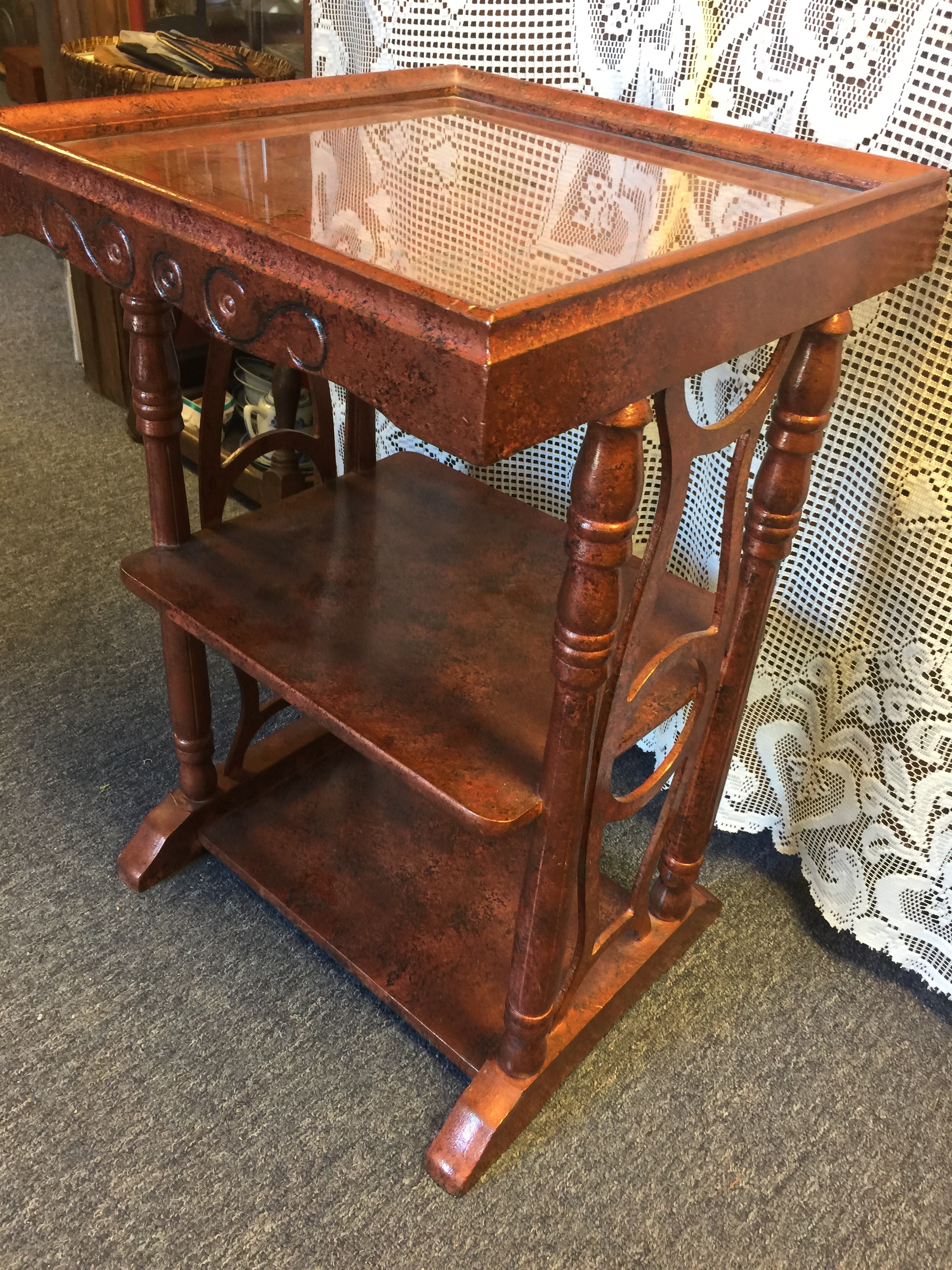 2-shelf end-table with glass top.