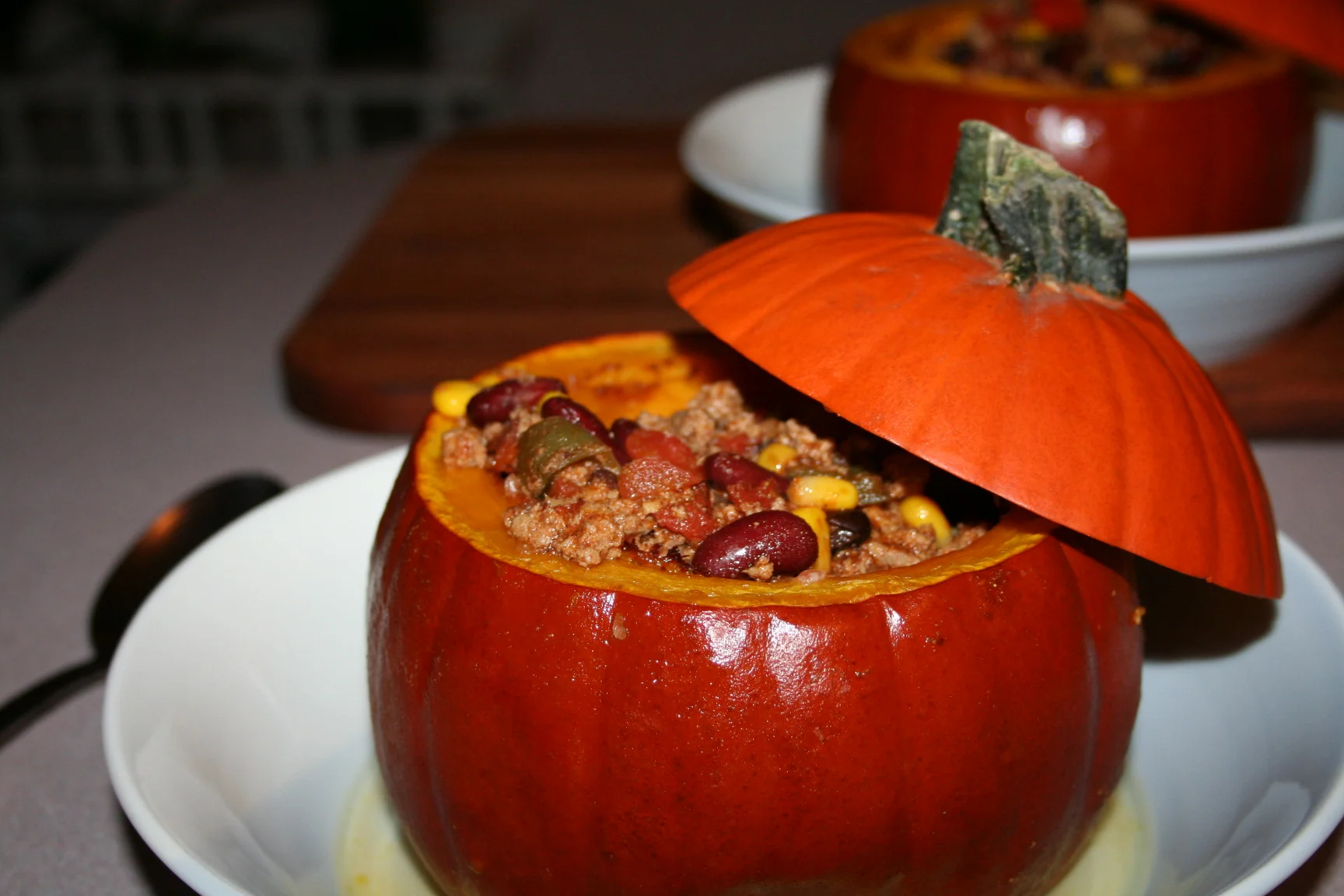 Turkey Chili served in a Roasted Pumpkin