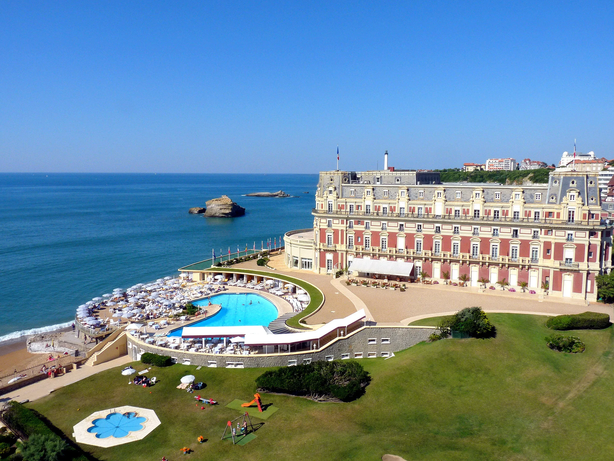 HOTEL DU PALAIS - $$$ - website If you are in the mood to splurge, this is the place to do it. (about $600 a night during the high season) This location was built by Napoleon III in the mid-19th century for his wife. (formerly Villa Eugenie). Its located on Miramar beach, directly next to the Grand Plage. You will be among some good company as Coco Chanel, Frank Sinatra & Ava Gardner have stayed there. 