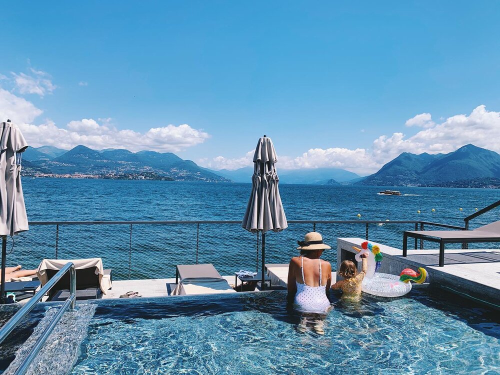 Lago Maggiore, Italy - where the most difficult decision of the day was: should we go to the lakeside pool or the rooftop pool? (Answer: both)

#italyiloveyou #lagomaggiore #roadtrip #expatlife #beautifuldestinations #travelingwithatoddler #hlplife #