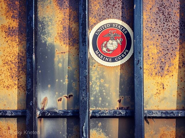 USMC Sticker on Rusted Industrial Fence, Houston, Texas #rusted #rustedmetal #USMC #usmcsticker #iphonography📱 #iphonography #houstonphotographer #houstonheights