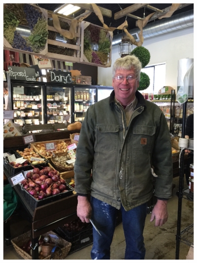 Norm Holtz of Norman Holtz Farms in Ida, Michigan stops in to deliver some of his Carolina Ruby and Beauregard Sweet Potatoes and to pick up his check!!