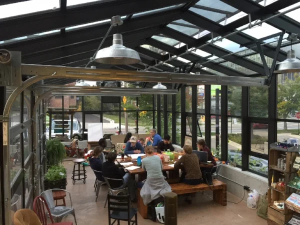 Our greenhouse serves as a place for friends and neighbors to meet and enjoy beverages/pastries before or after shopping!