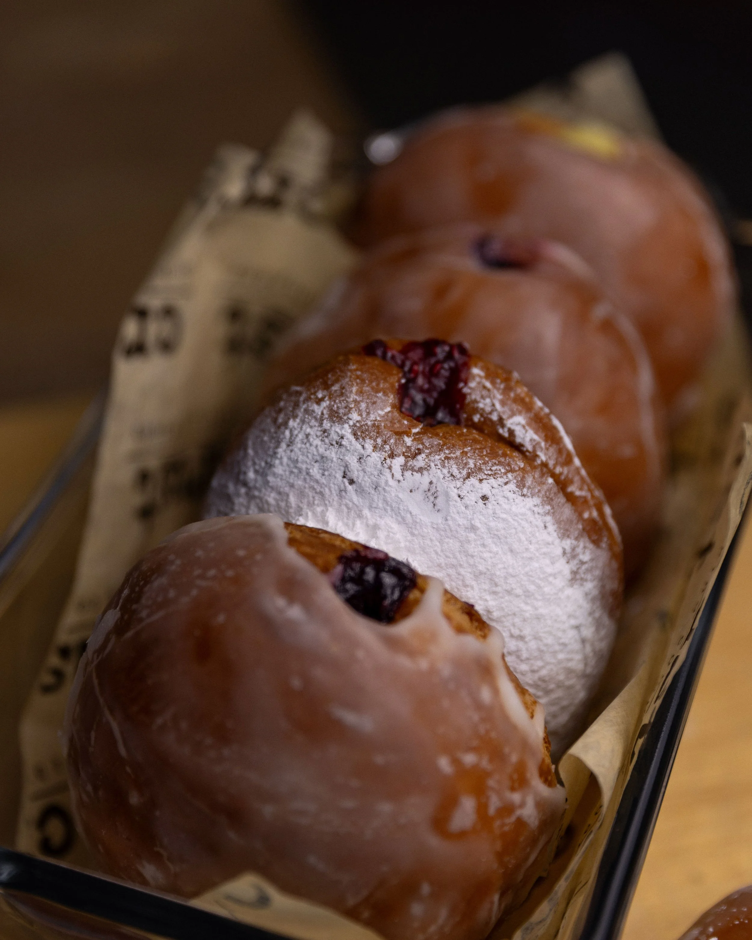 Pączki glaze and with frosted sugar from Crust Bakery