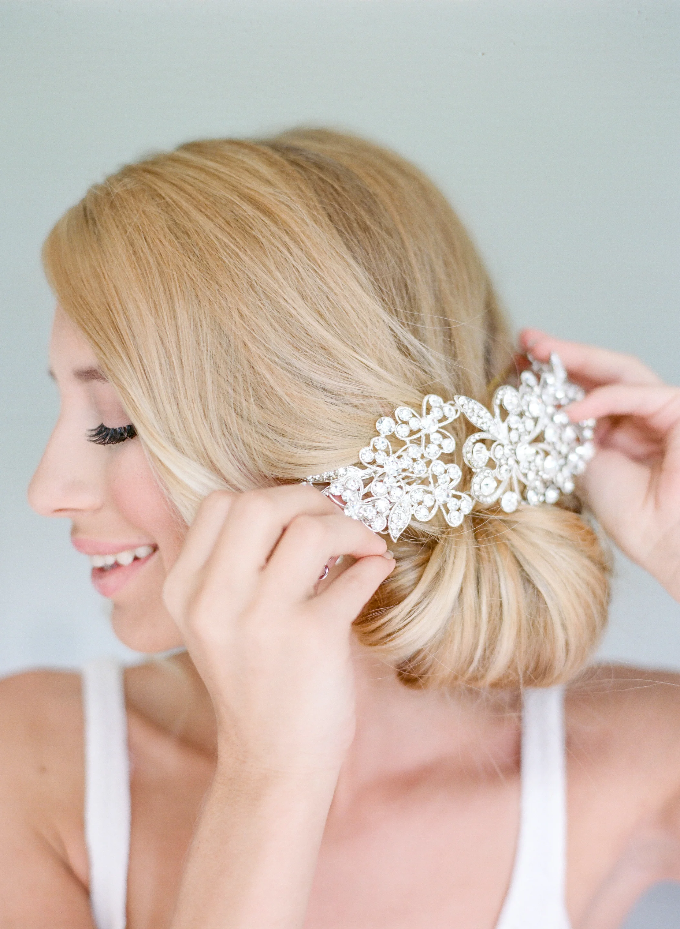 OPTIONAL | Secure just above twisted bun for a touch of elegance