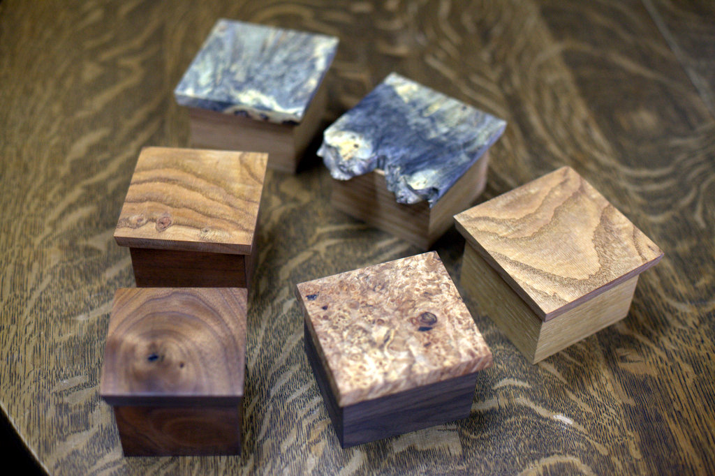 Small 4x4x2.5 inch boxes.