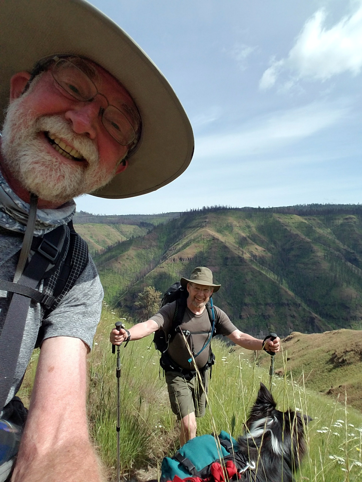  Coming up Smooth Ridge. Smiling as we didn't know what was ahead. Trail here was well defined and relatively clear. A few blow downs in a short section that was affected by what seemed to be a microburst of wind, maybe 2 dozen burned snags topped at