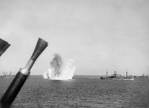 12 August: Evening air and submarine attacks: A bomb falling astern of MS GLENORCHY, which was later sunk by air attack.