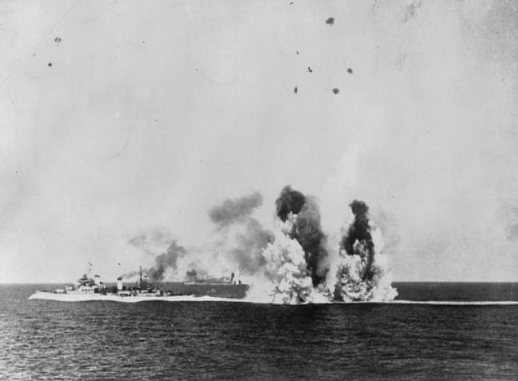 12 August: Evening Air and Submarine attacks: HMS KENYA under air attack on her return voyage to Gibraltar.
