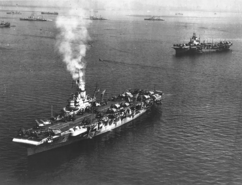 HMS FORMIDABLE is in the foreground of this picture of BPF carriers and cruisers anchored at Leyte.