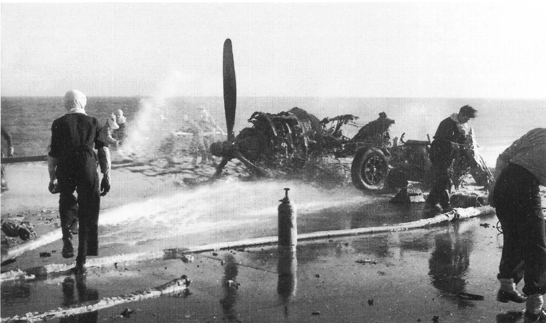 All that remains of a burnt-out Corsair aboard HMS FORMIDABLE.