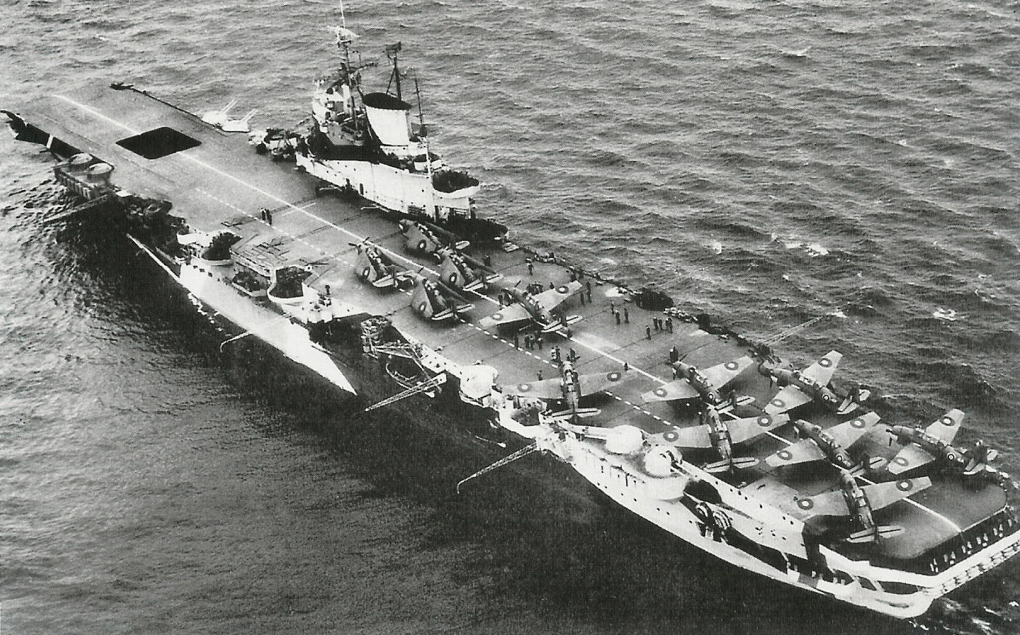 Indomitable in April 1944 carrying Hellcats and Avengers.