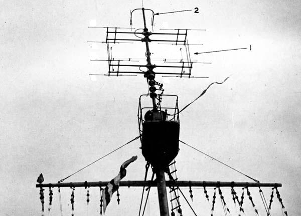 A Type 281 antenna (1) and a Type 243 IFF interrogator. The Type 281 air search radar entered service in February 1941 could detect a bomber at 115nm (132 miles, 213km). Specific reported performance was 88-115nm at 16,000ft, 38-50nm for aircraft at 3000ft., 7-9nm for 100ft. Range accuracy was 100yds between 14,000 and 28,000yds, with a bearing accuracy of 1 degree.