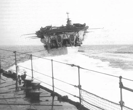 Hurricanes of No 46 Squadron RAF park on HMS Glorious' aft flight deck after successfully landing on without any arrester hooks or pilot deck experience.