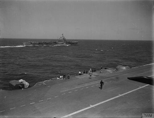This photo is incorrectly captioned by the IWM. It is of HMS INDOMITABLE, photographed from VICTORIOUS.