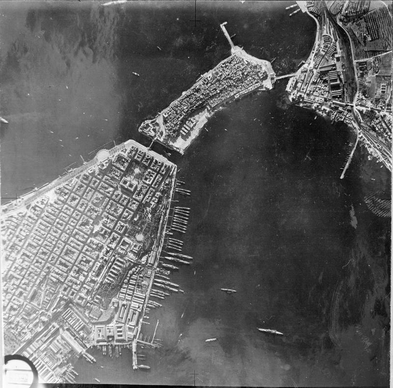 The line of destroyers and cruisers arrayed along the quay in Mar Piccolo, as captured by a Maryland reconnaissance flight shortly before Operation Judgement.